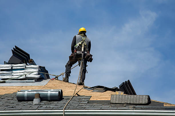 Professional Roofing technician working in Mont Belvieu, TX